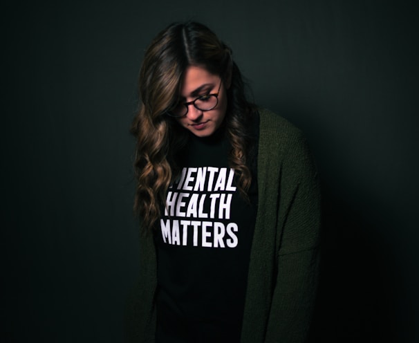 woman in black and white long sleeve shirt