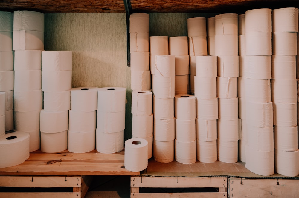 white rolled tissue paper rolls