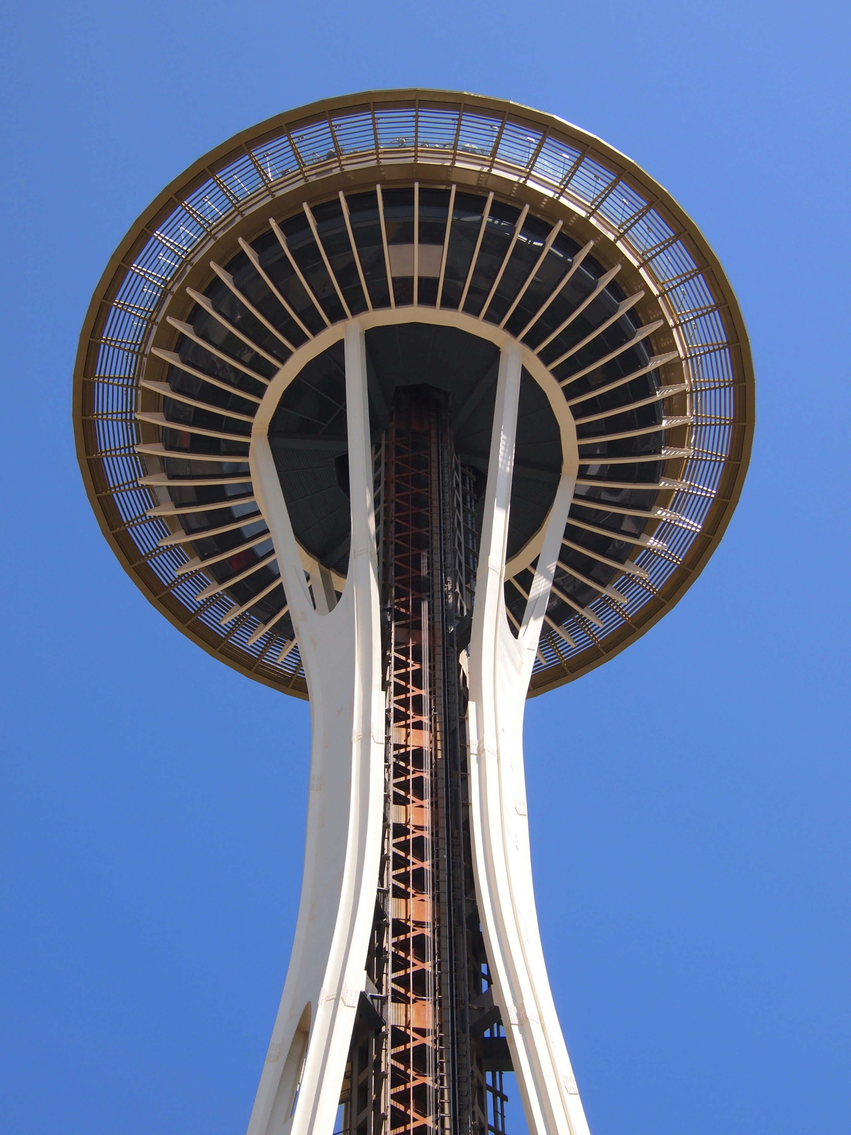 white and black round building under blue sky during daytime