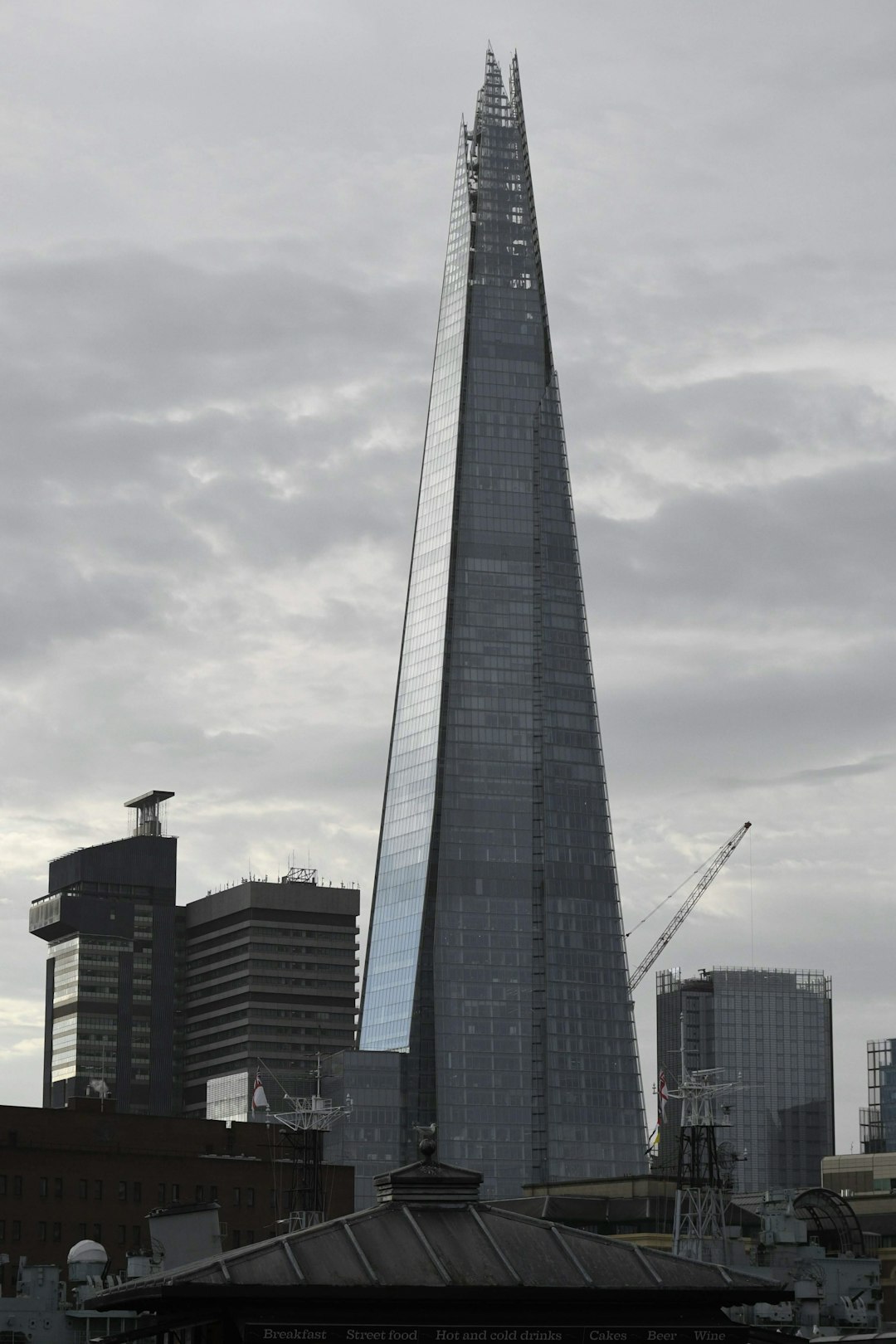 gray high rise building under gray sky