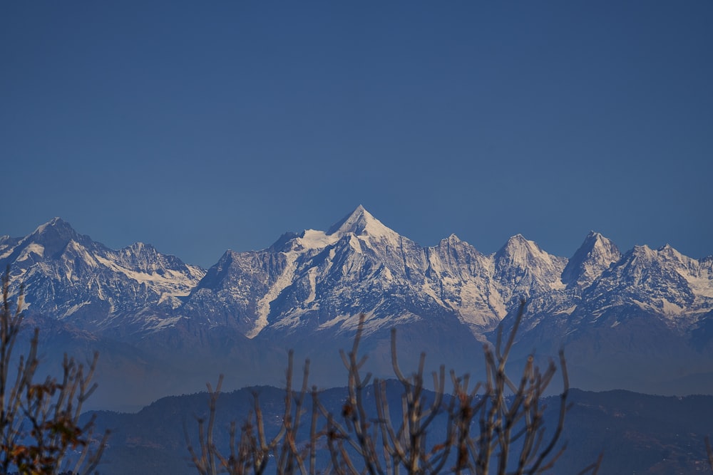 snow covered mountain during daytime