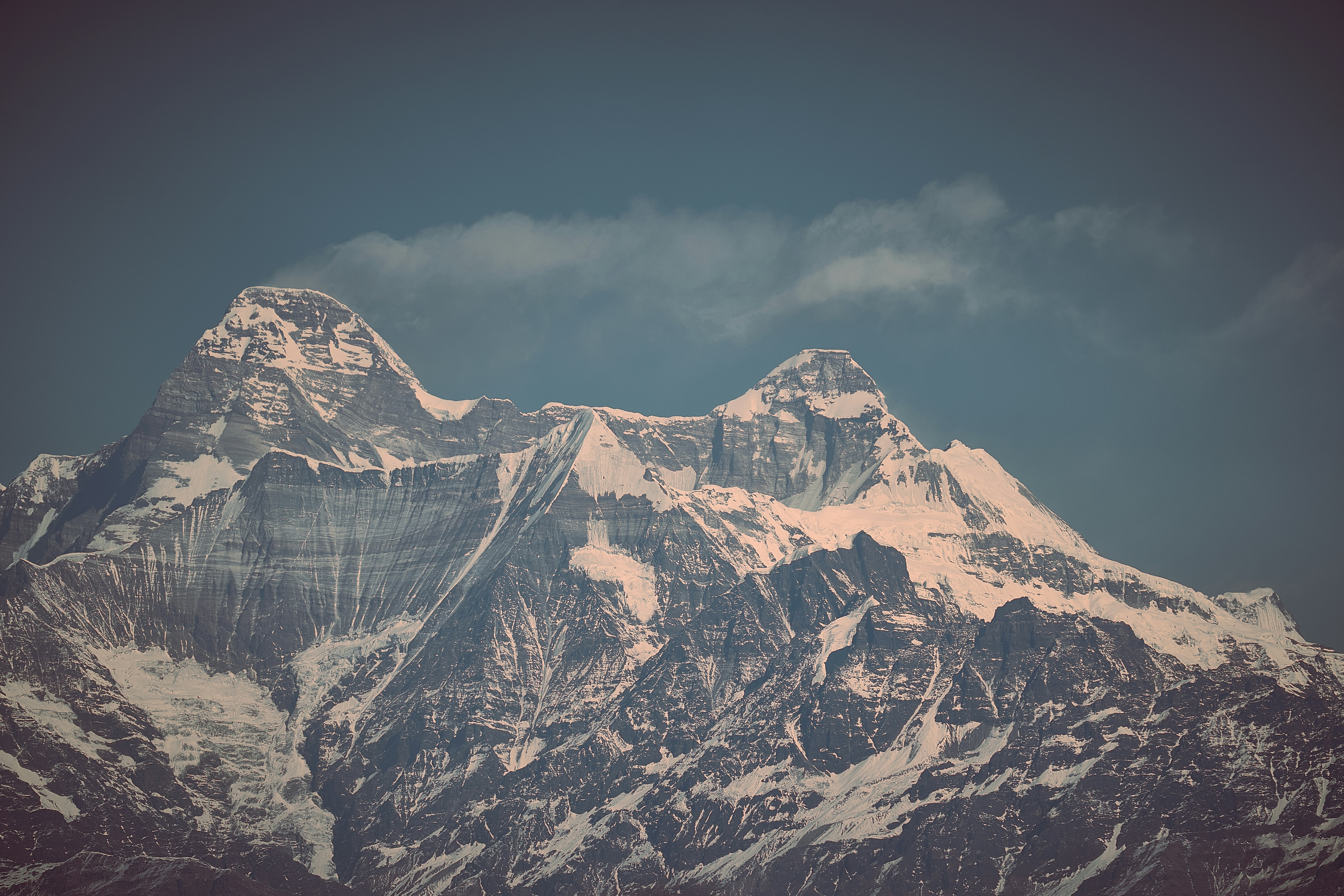 snow covered mountain under blue sky