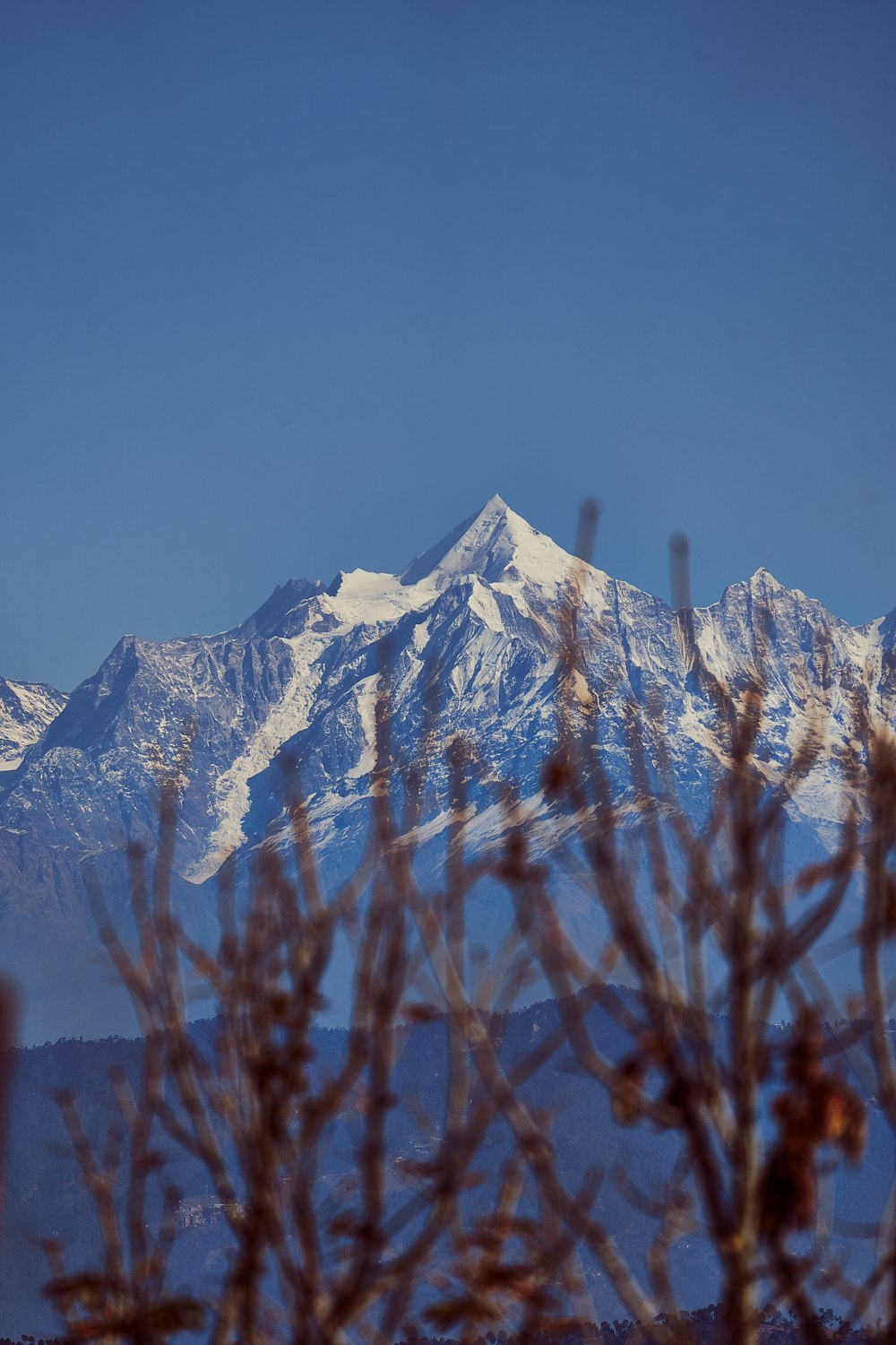 snow covered mountain during daytime