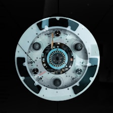 round gray and black device