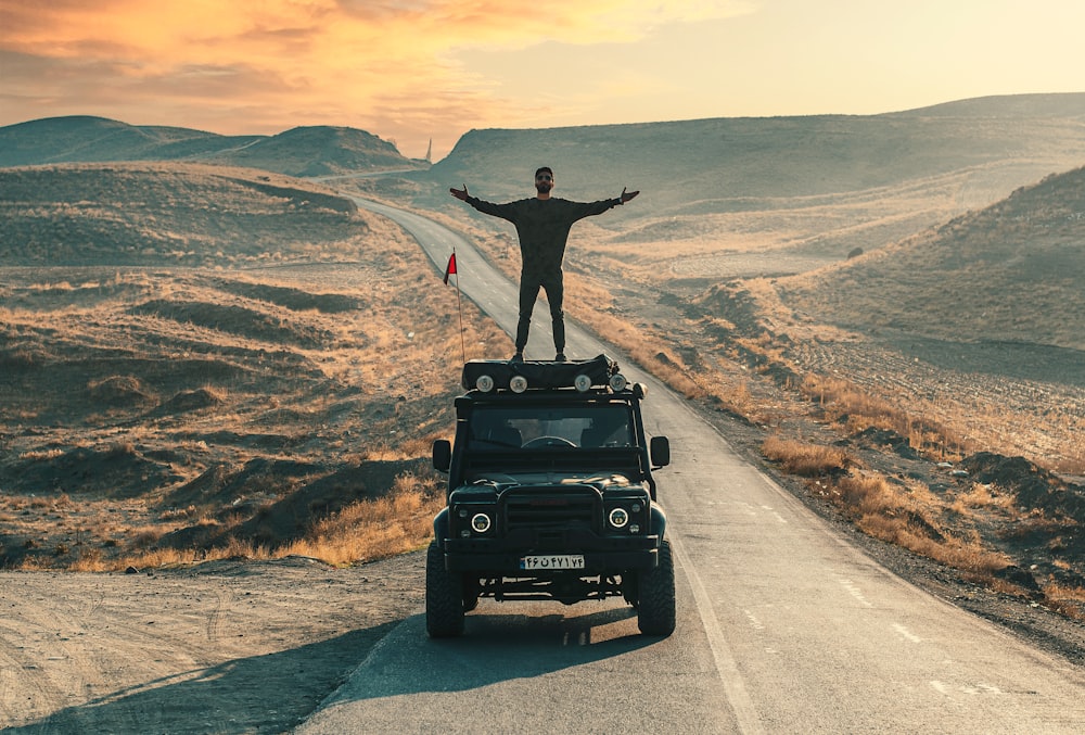 black jeep wrangler on road during daytime