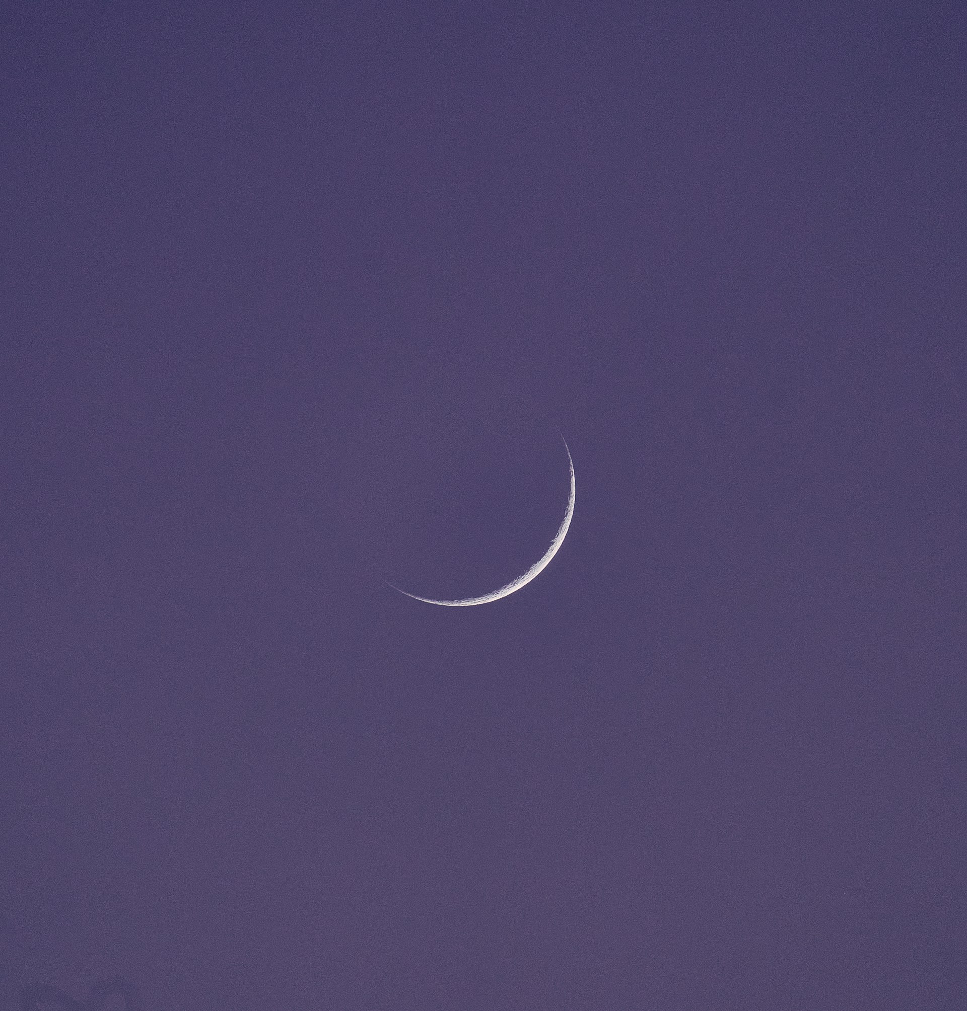 half moon in blue sky