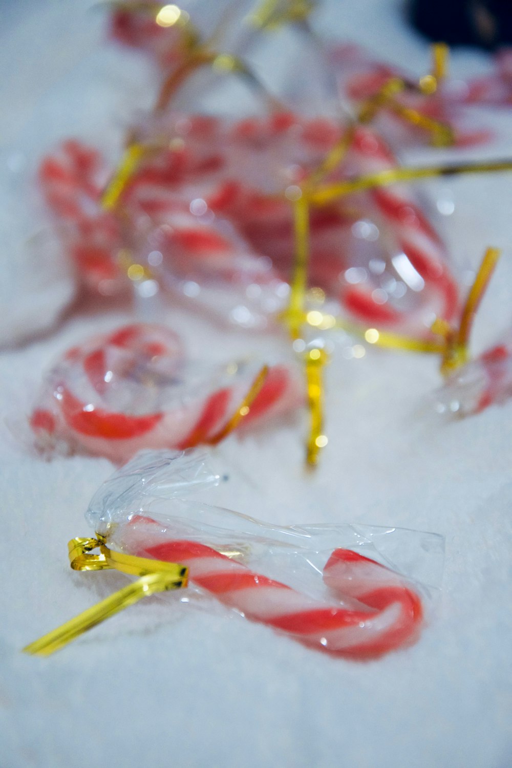 red and yellow beads on white surface