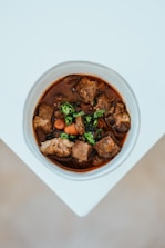 cooked food in white ceramic bowl
