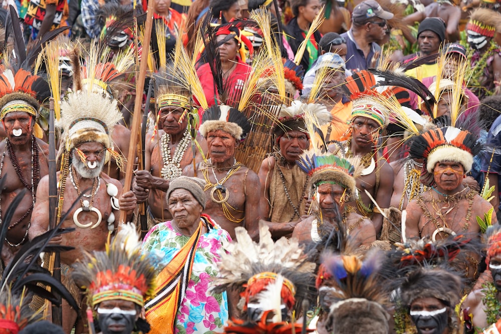 people in traditional dress with headdress