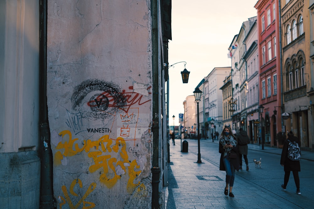 people walking on sidewalk during daytime