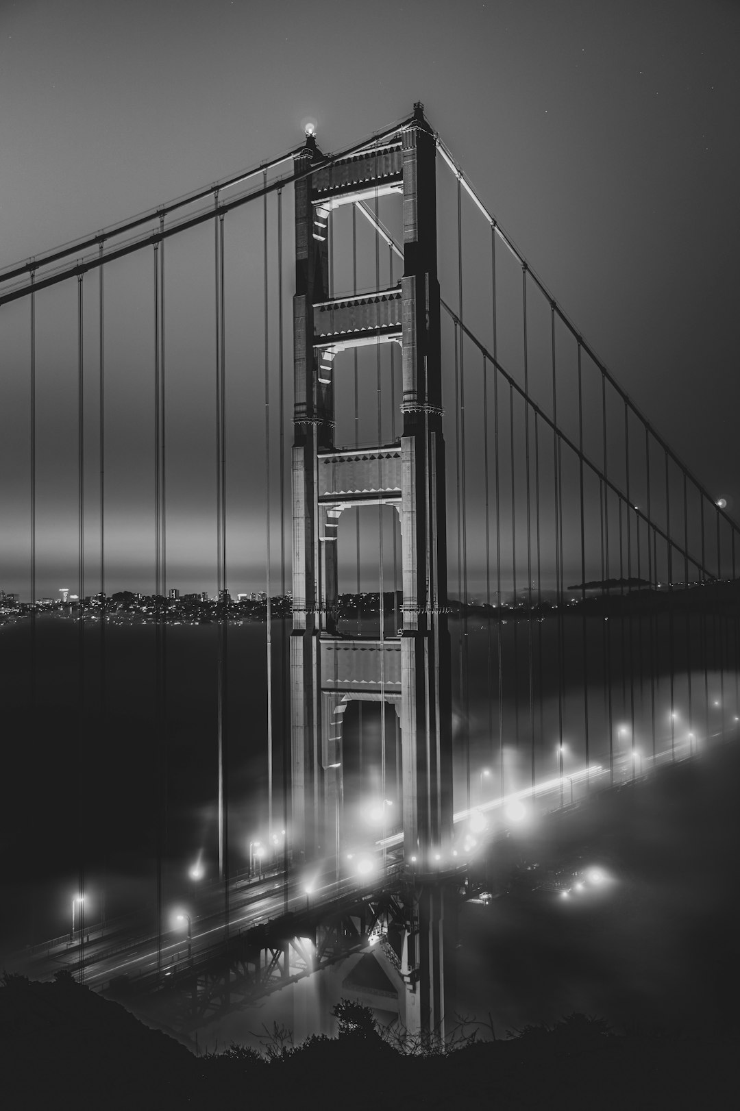 bridge with lights during night time