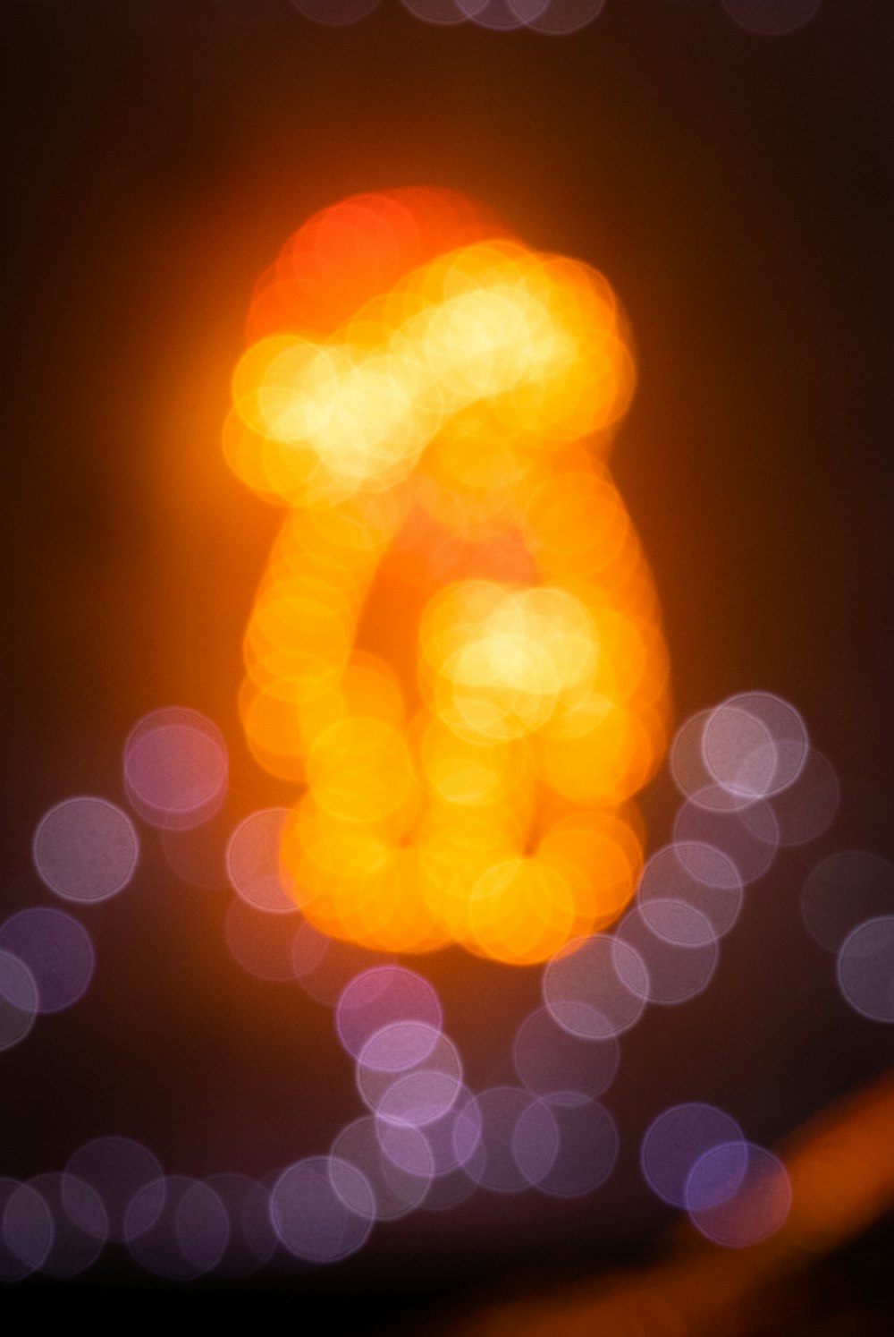 orange and white bokeh lights