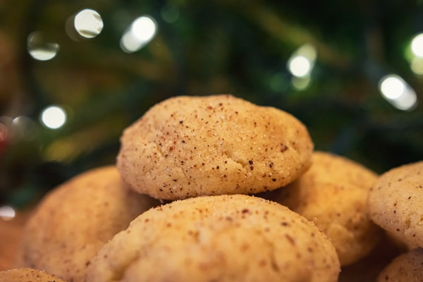 Brown cookies on black surface