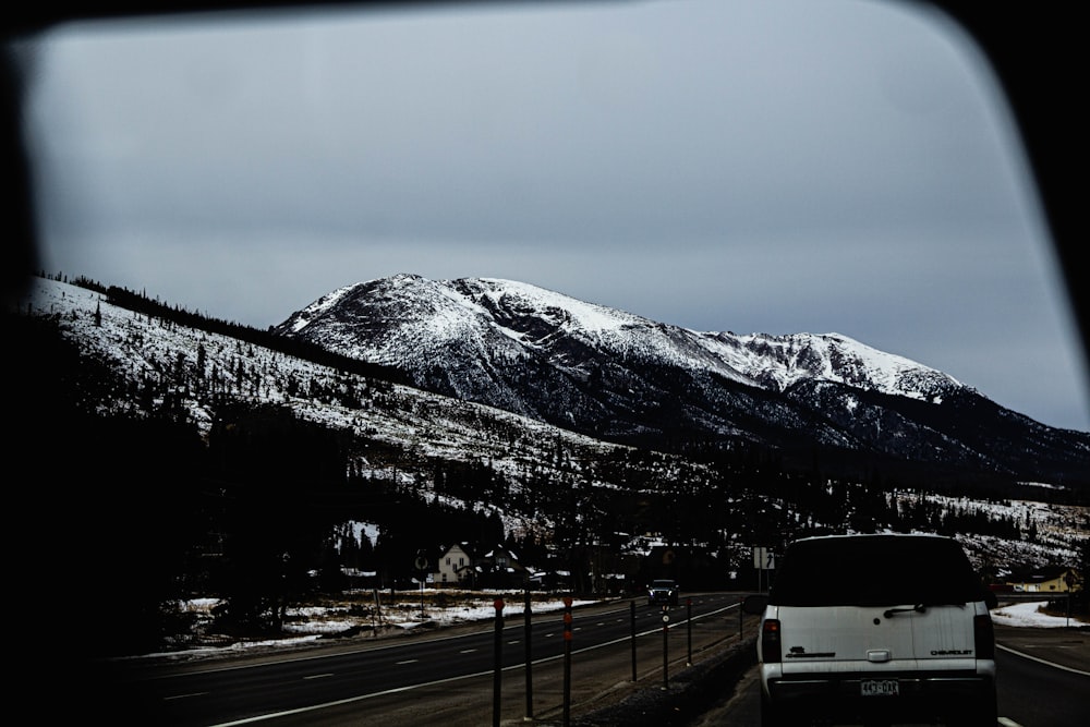 white and black mountain under white sky during daytime