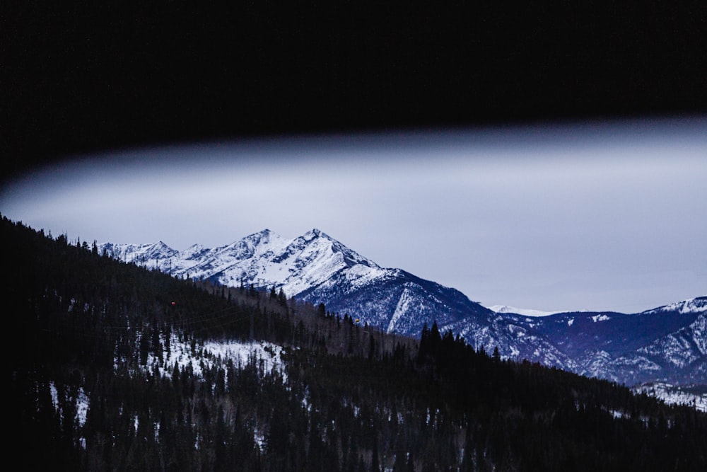 snow covered mountain during daytime