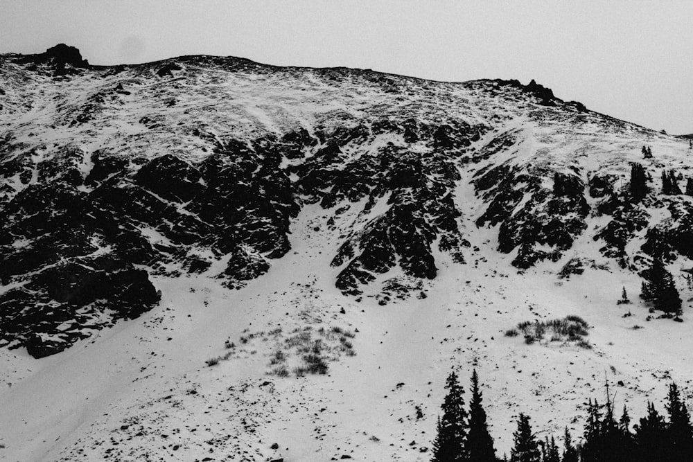 grayscale photo of snow covered mountain