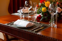 Close-up of woven jute table mats beautifully set on a dining table with soft natural light.