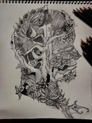 Intricate black and grey composition tattoo blending nature elements.