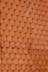 brown brick wall during daytime