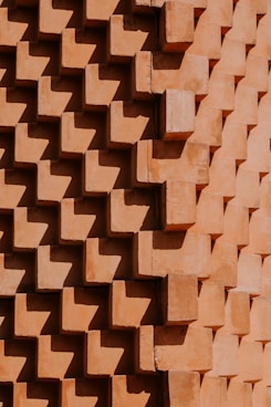 brown brick wall during daytime