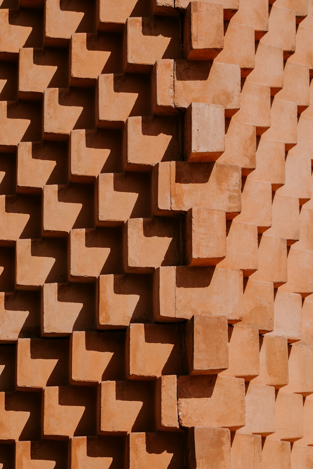 brown brick wall during daytime