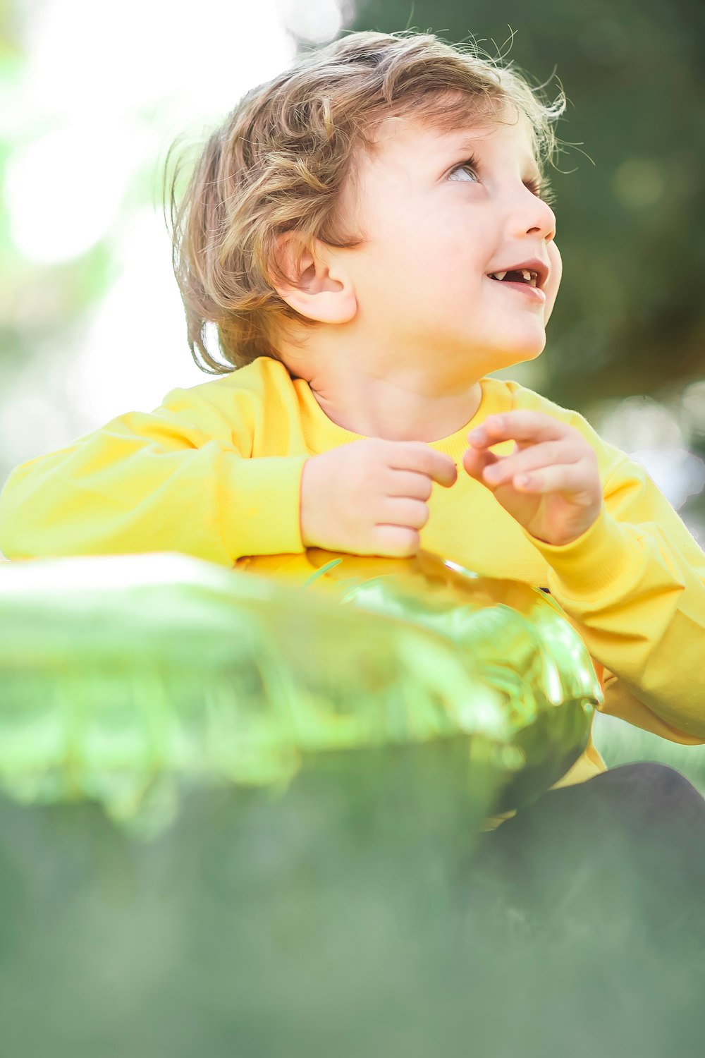 girl in yellow long sleeve shirt