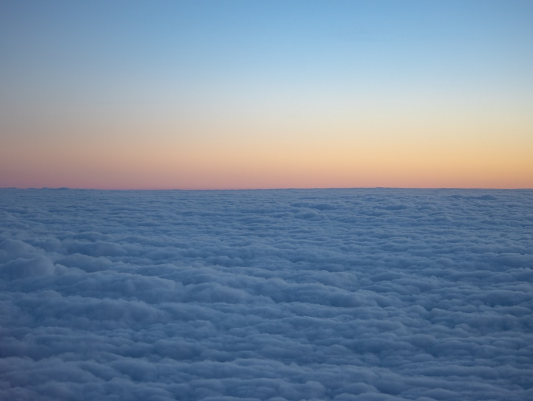 white clouds during golden hour