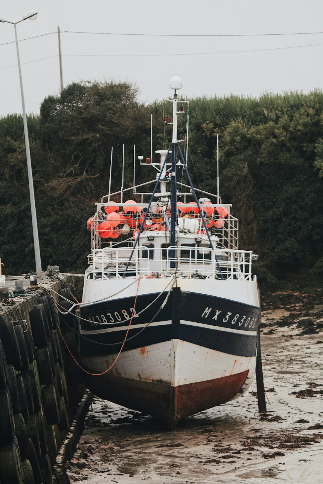 white and black ship on sea during daytime