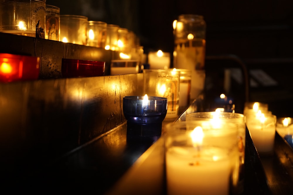 candles on brown wooden table