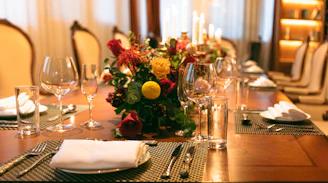 red and yellow flowers on table