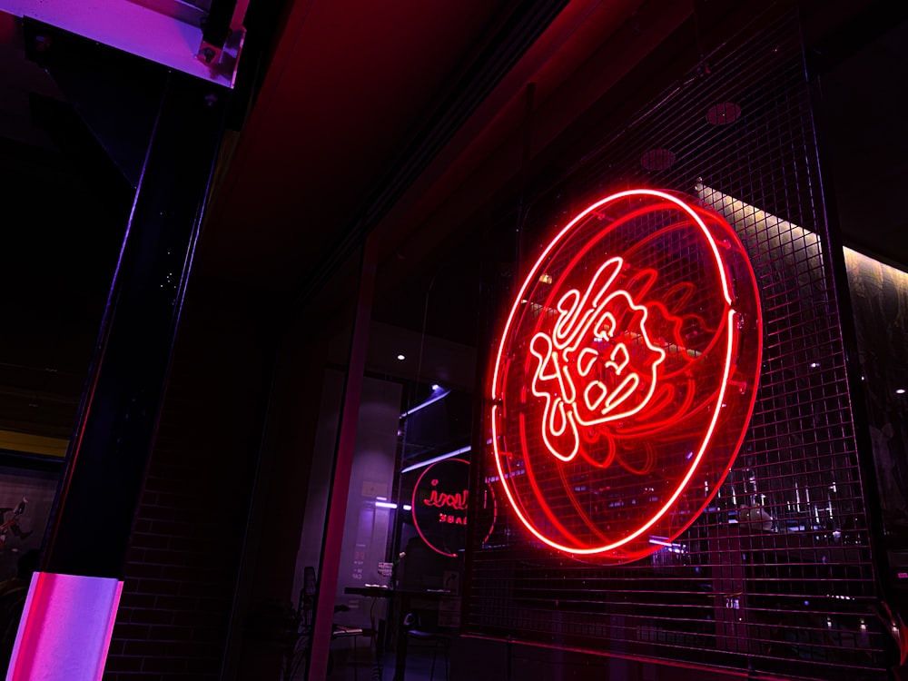 red and white neon light signage