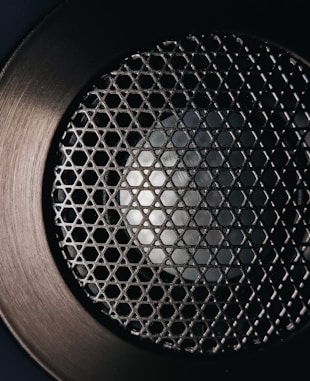 brown and black round speaker