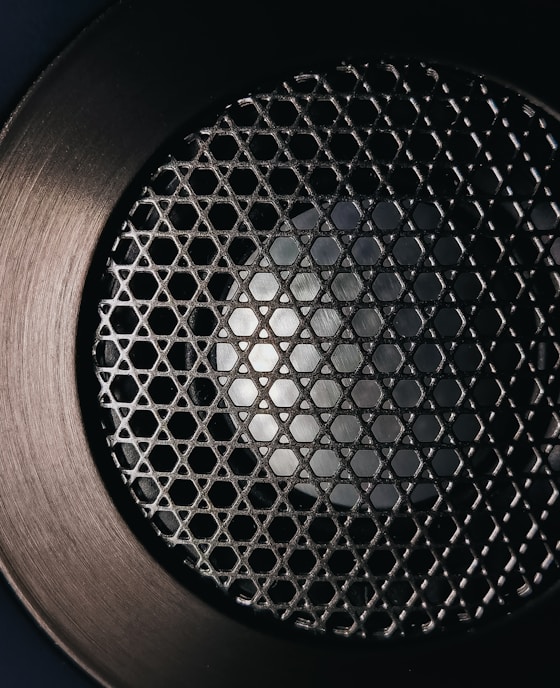 brown and black round speaker