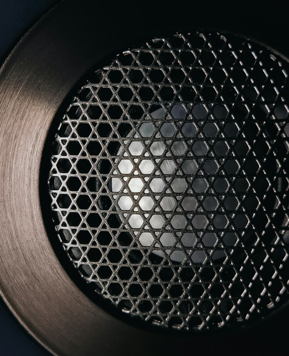 brown and black round speaker