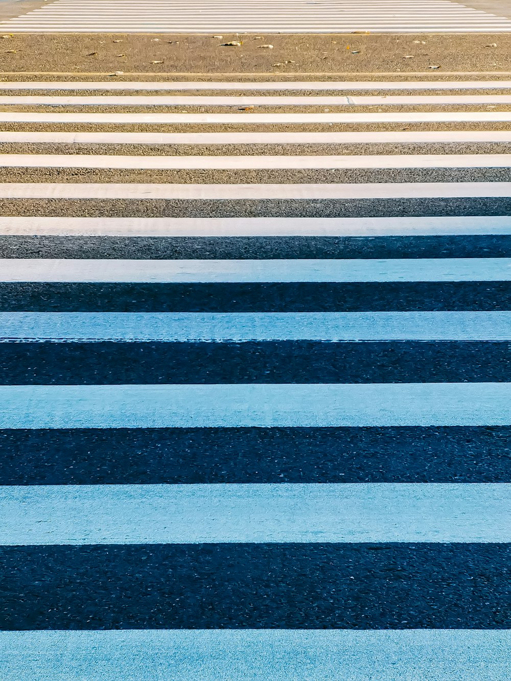 black white and blue striped textile