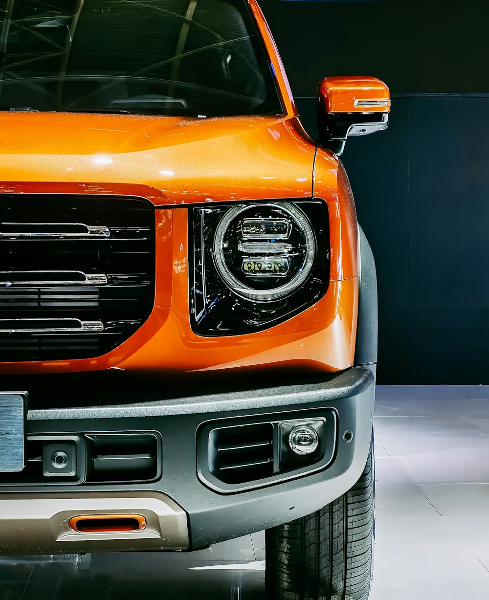 orange and black ford mustang