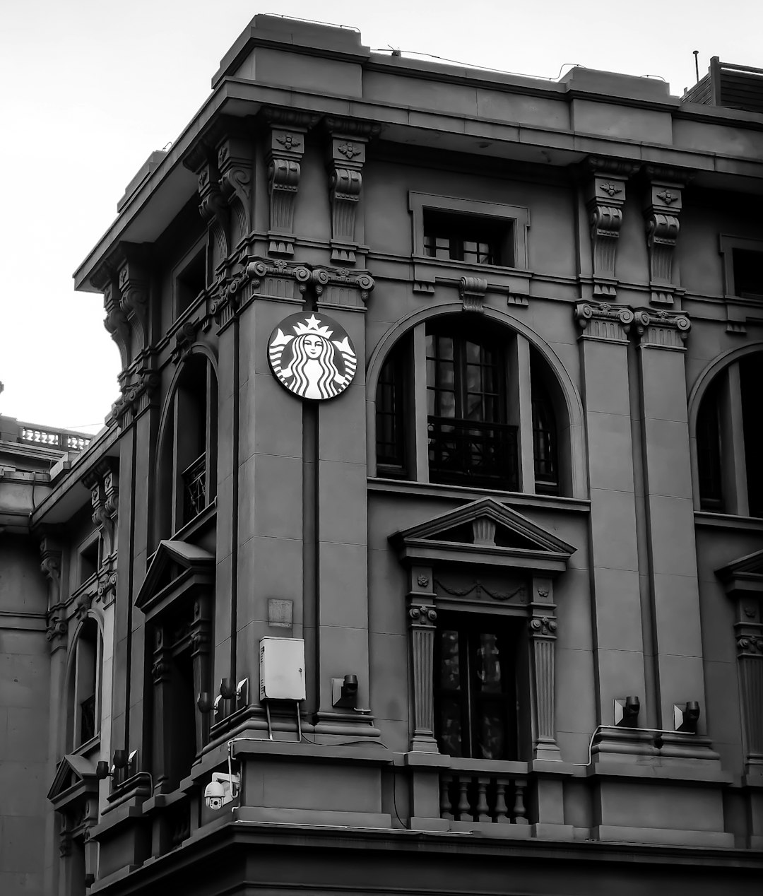 grayscale photo of concrete building