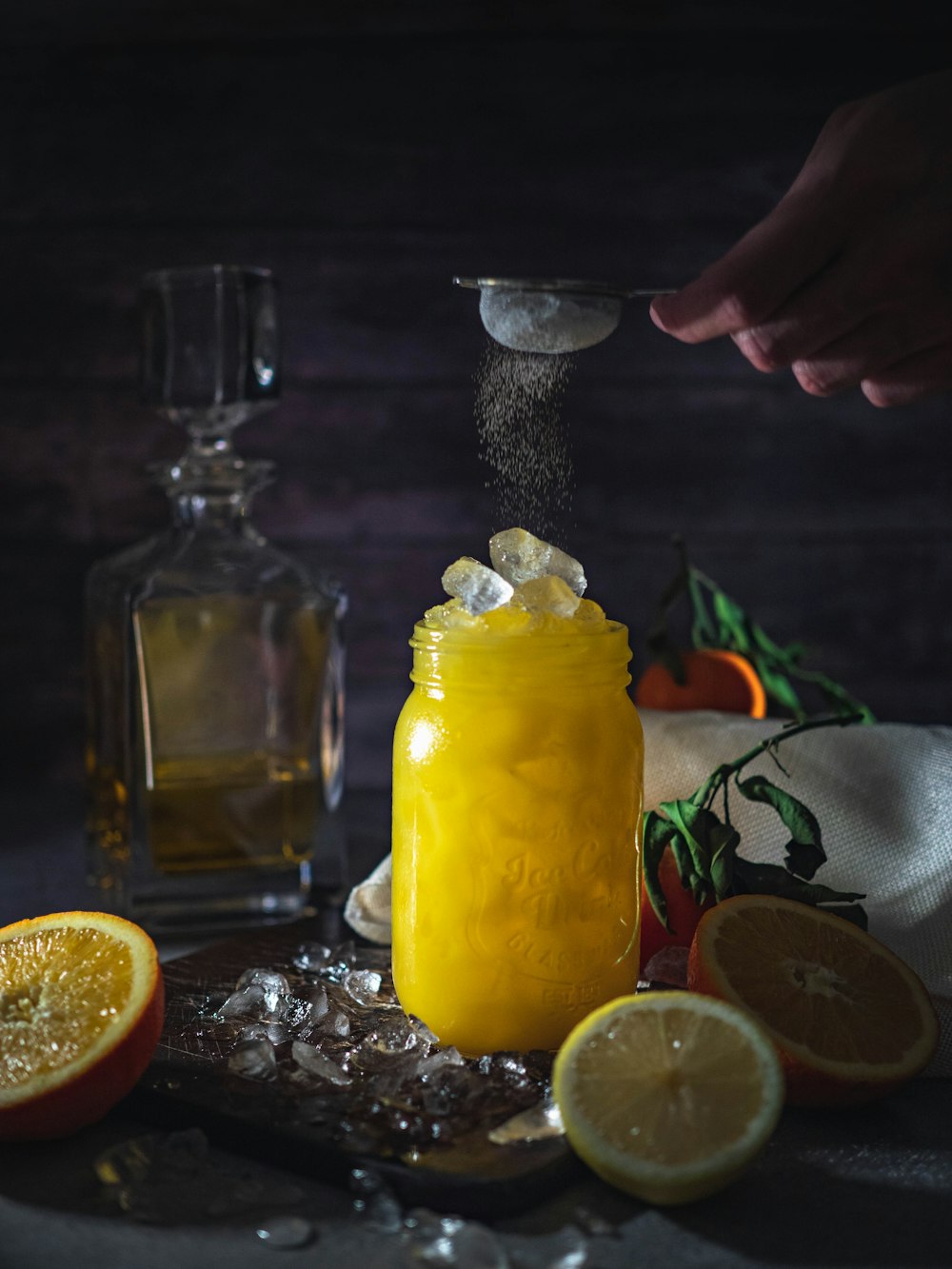 yellow liquid in clear glass bottle