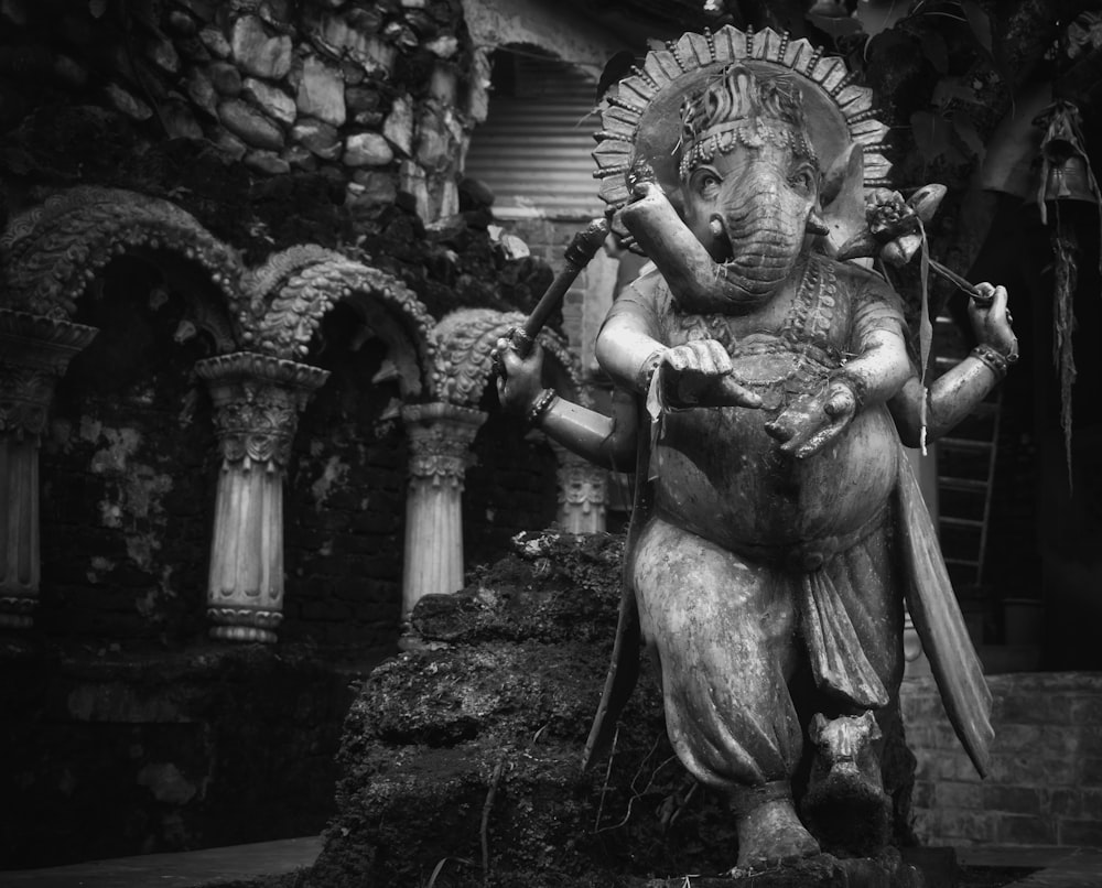 grayscale photo of angel statue