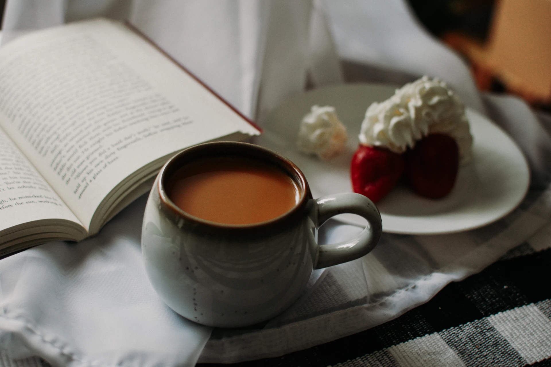 white ceramic mug on white ceramic saucer
