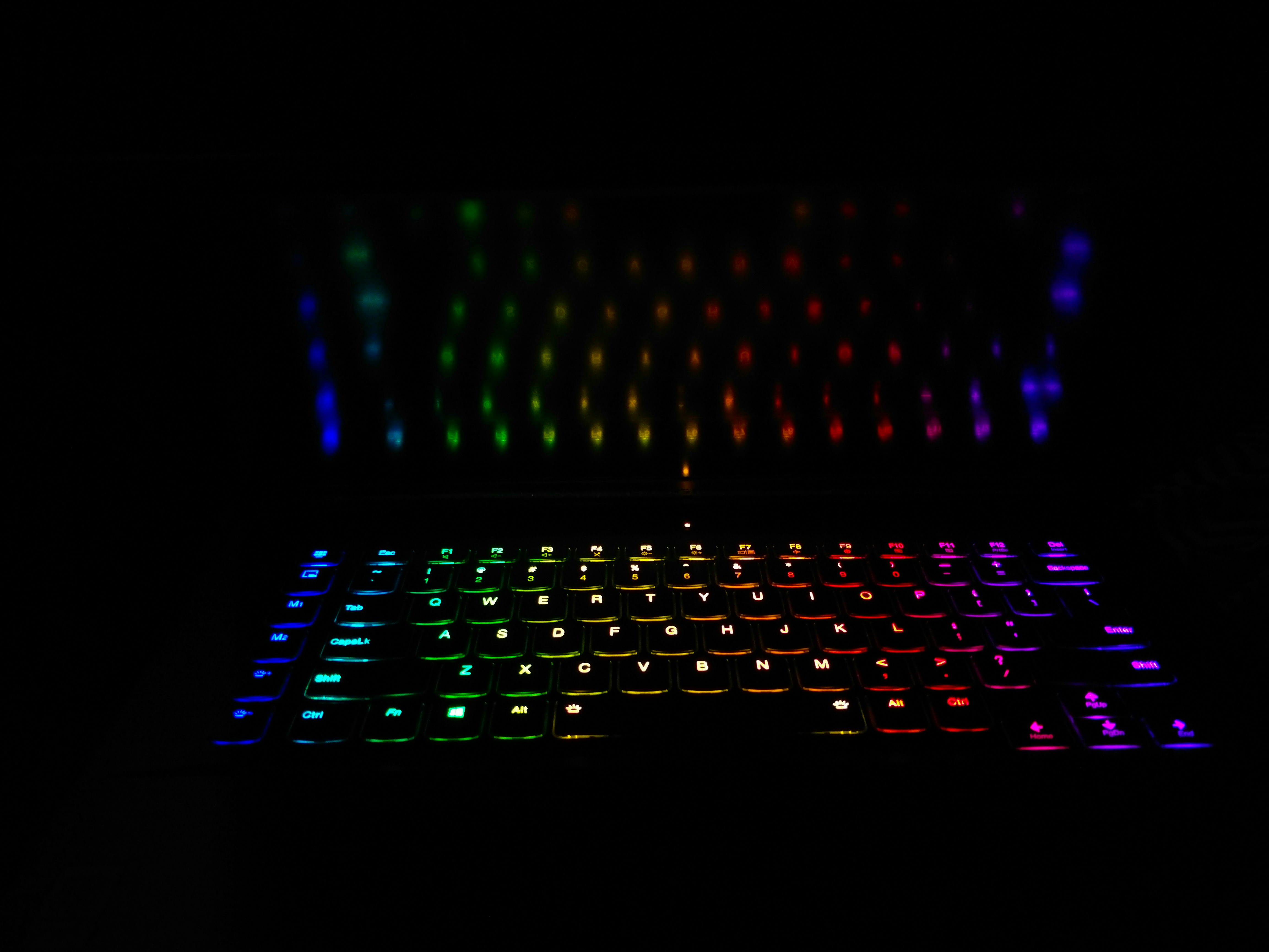 black and blue lighted computer keyboard