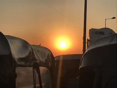 Evening light casting a welcoming glow on the social truck in a hamlet.