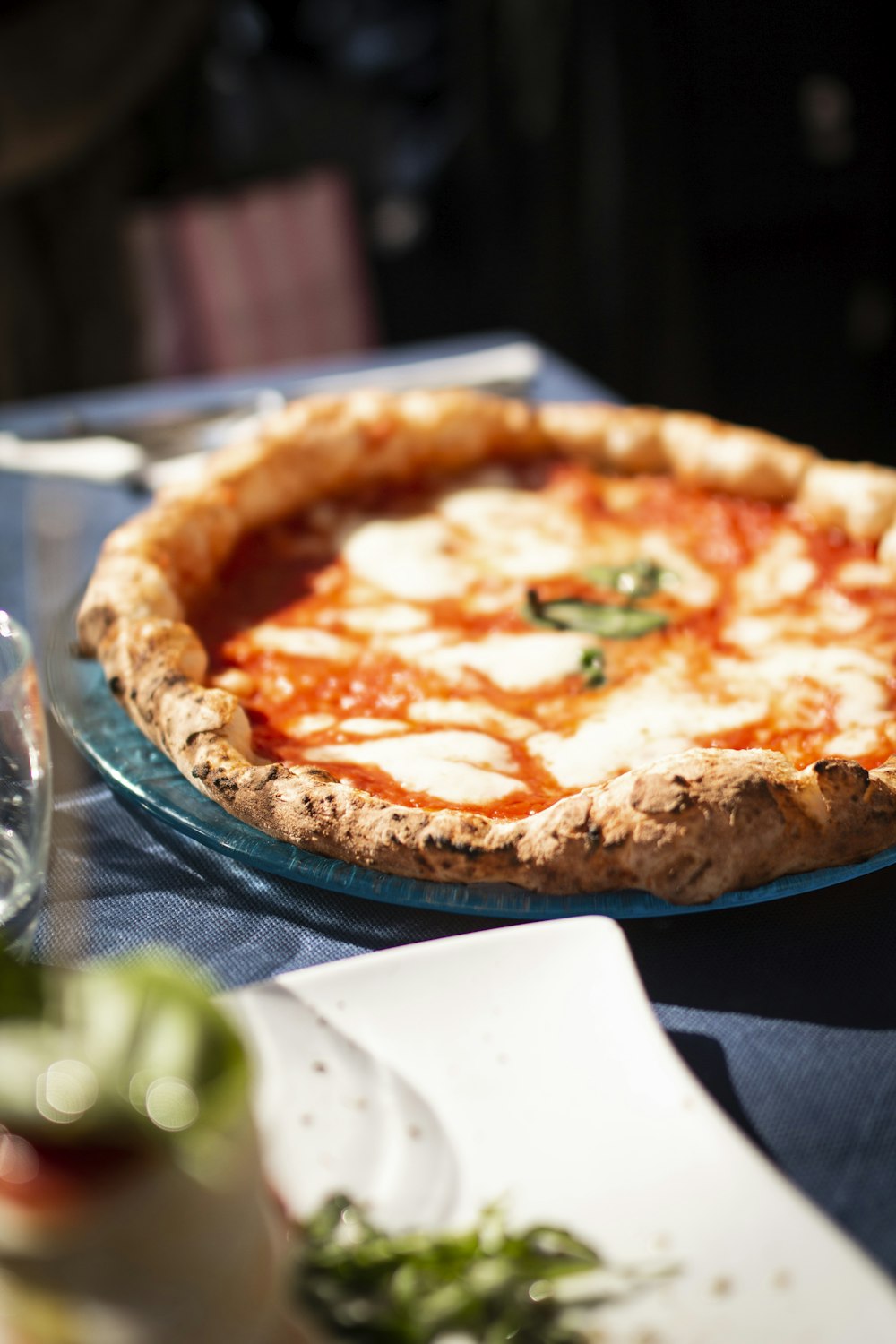 pizza on brown wooden tray