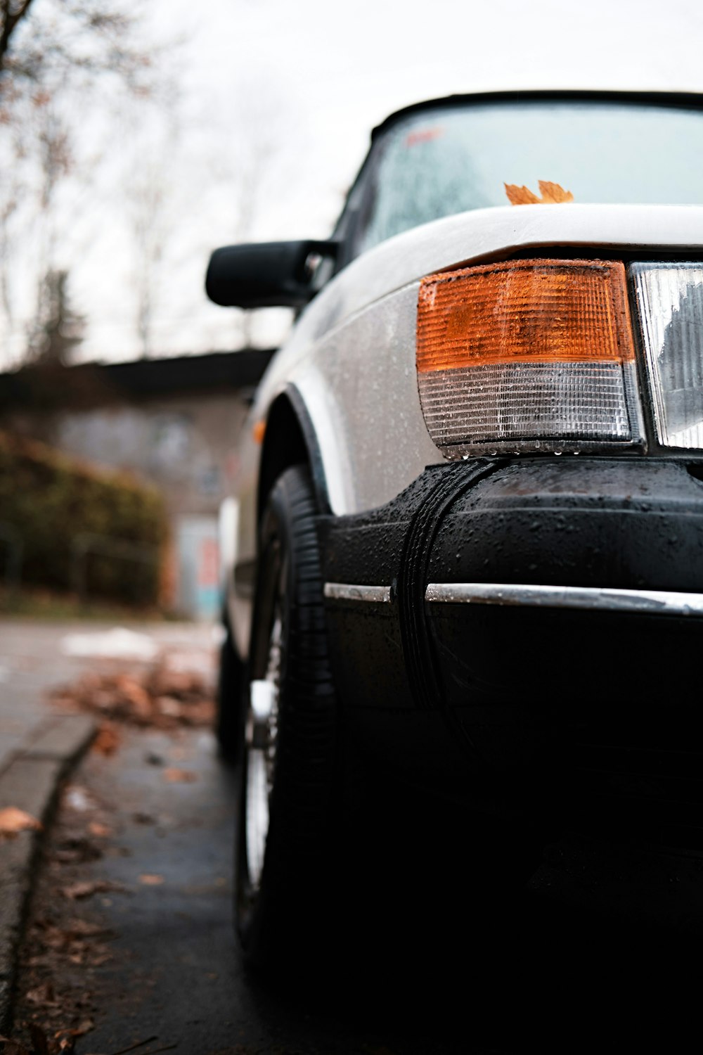 black car with orange and white sticker