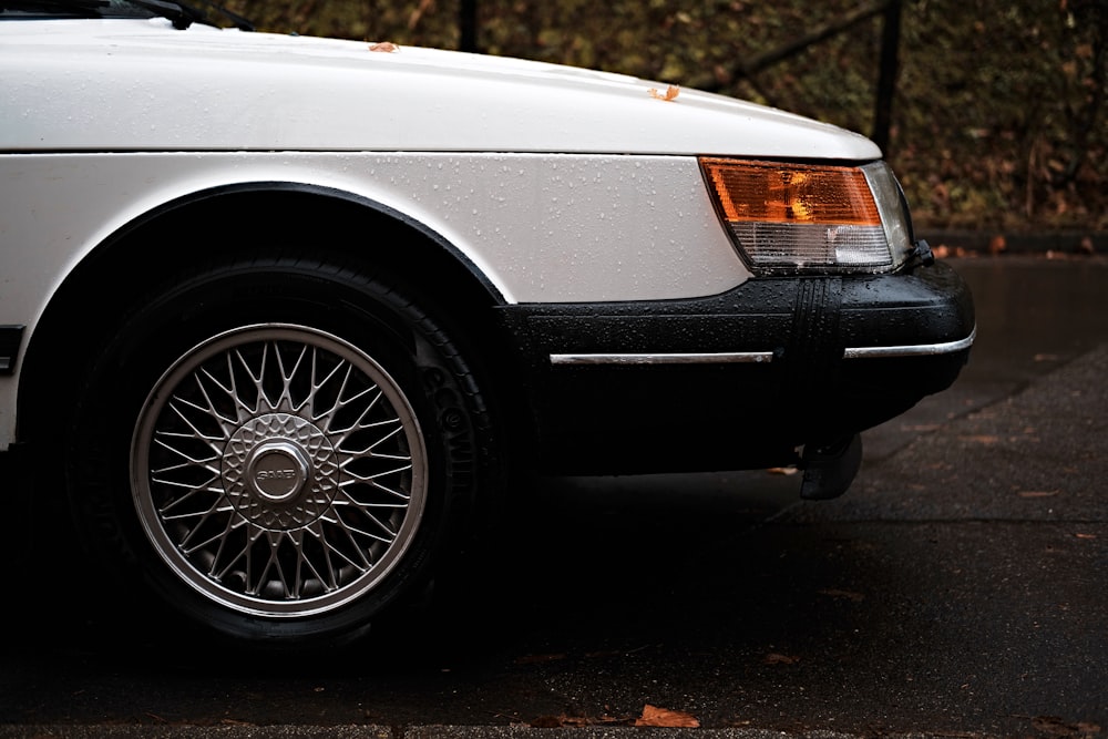 white car with chrome wheel