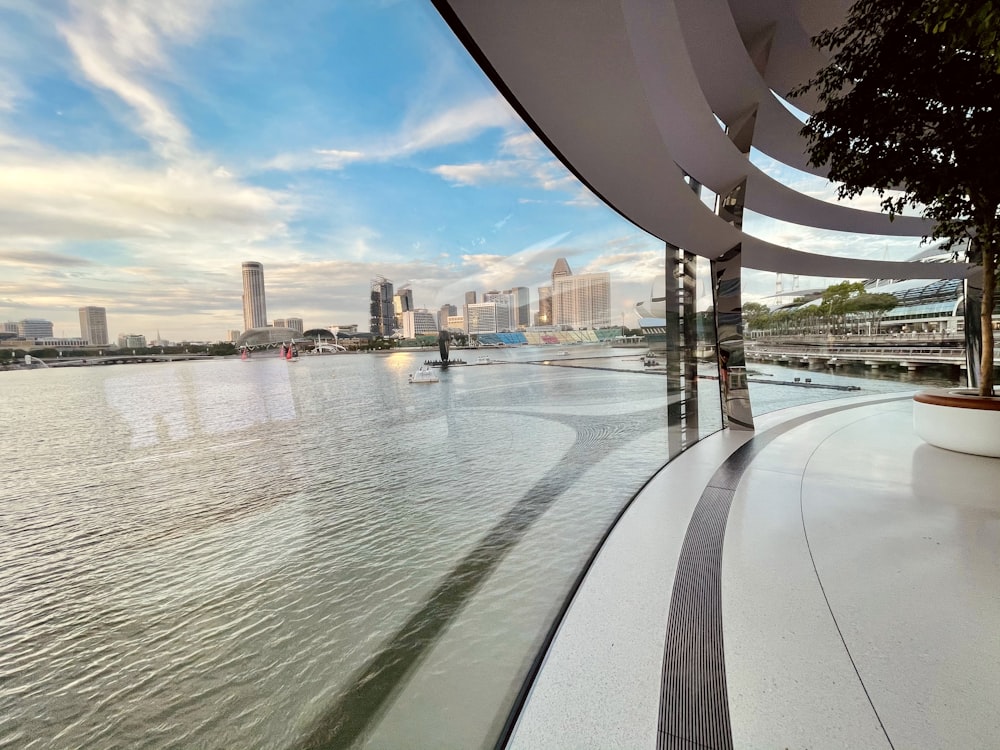 body of water near city buildings during daytime