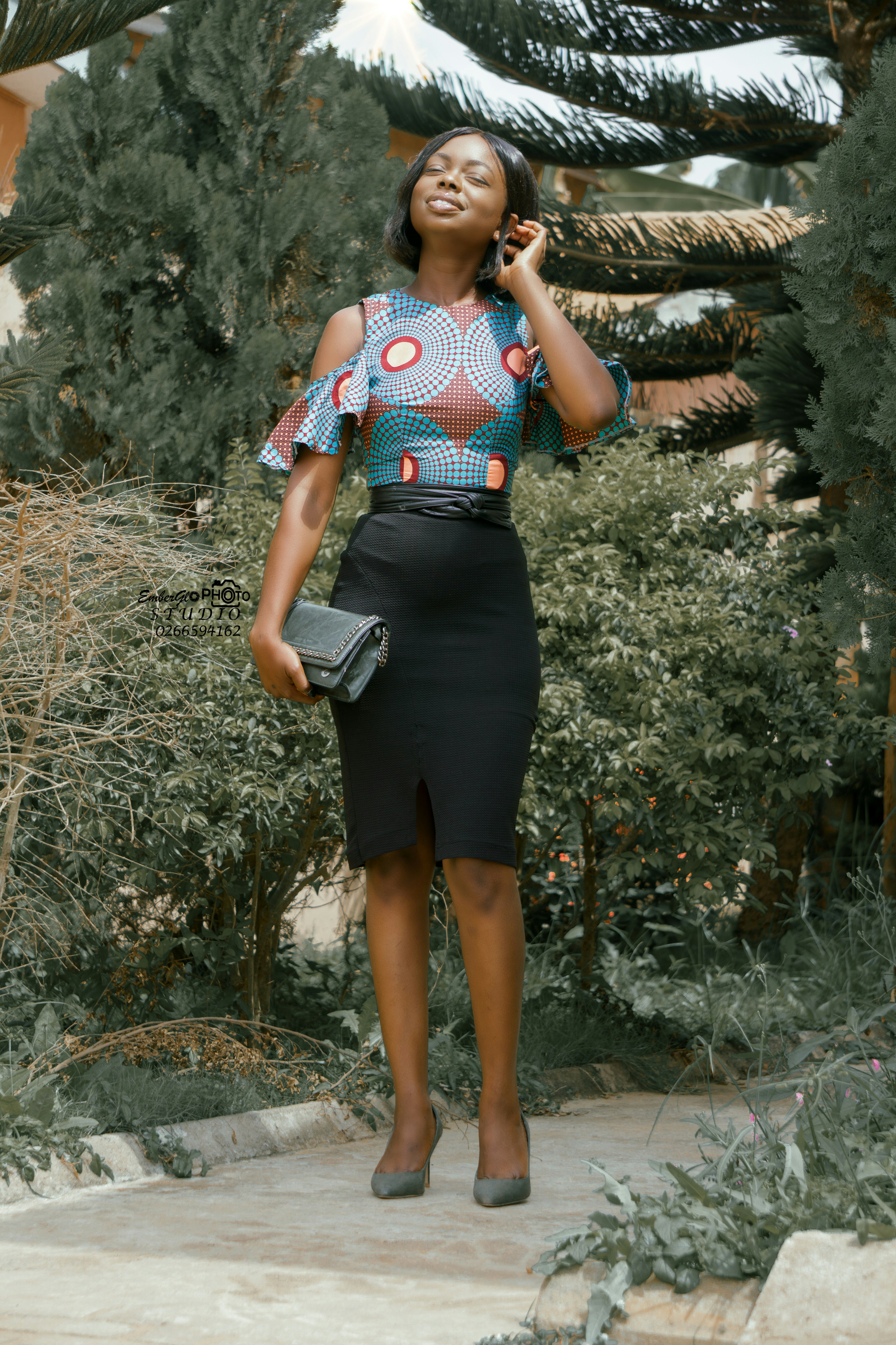 Classic pencil skirt worn with a patterned top