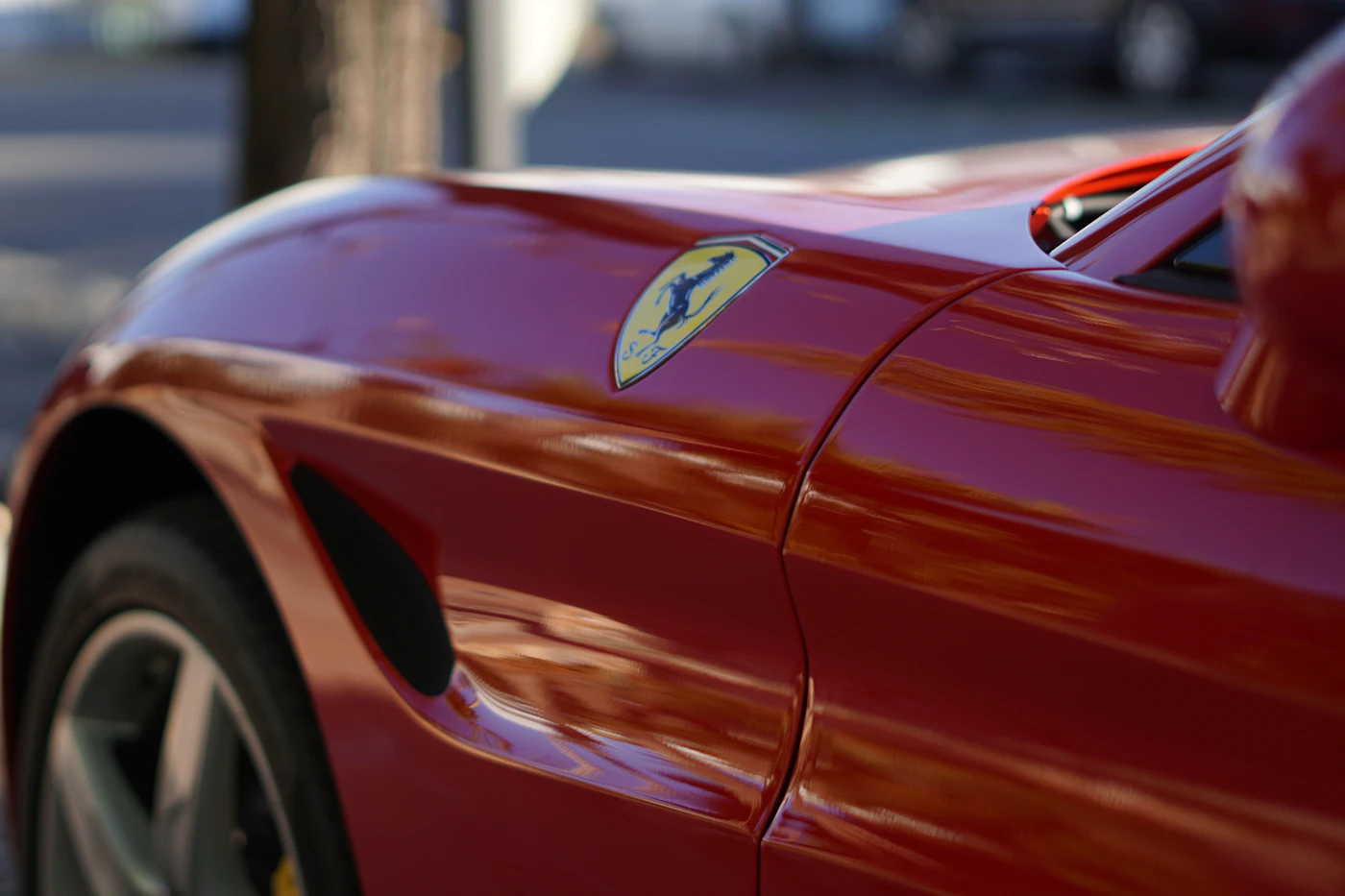 Red sports car on the road