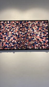 Island floating frame featuring an 8-ply mat surrounding a vibrant painting