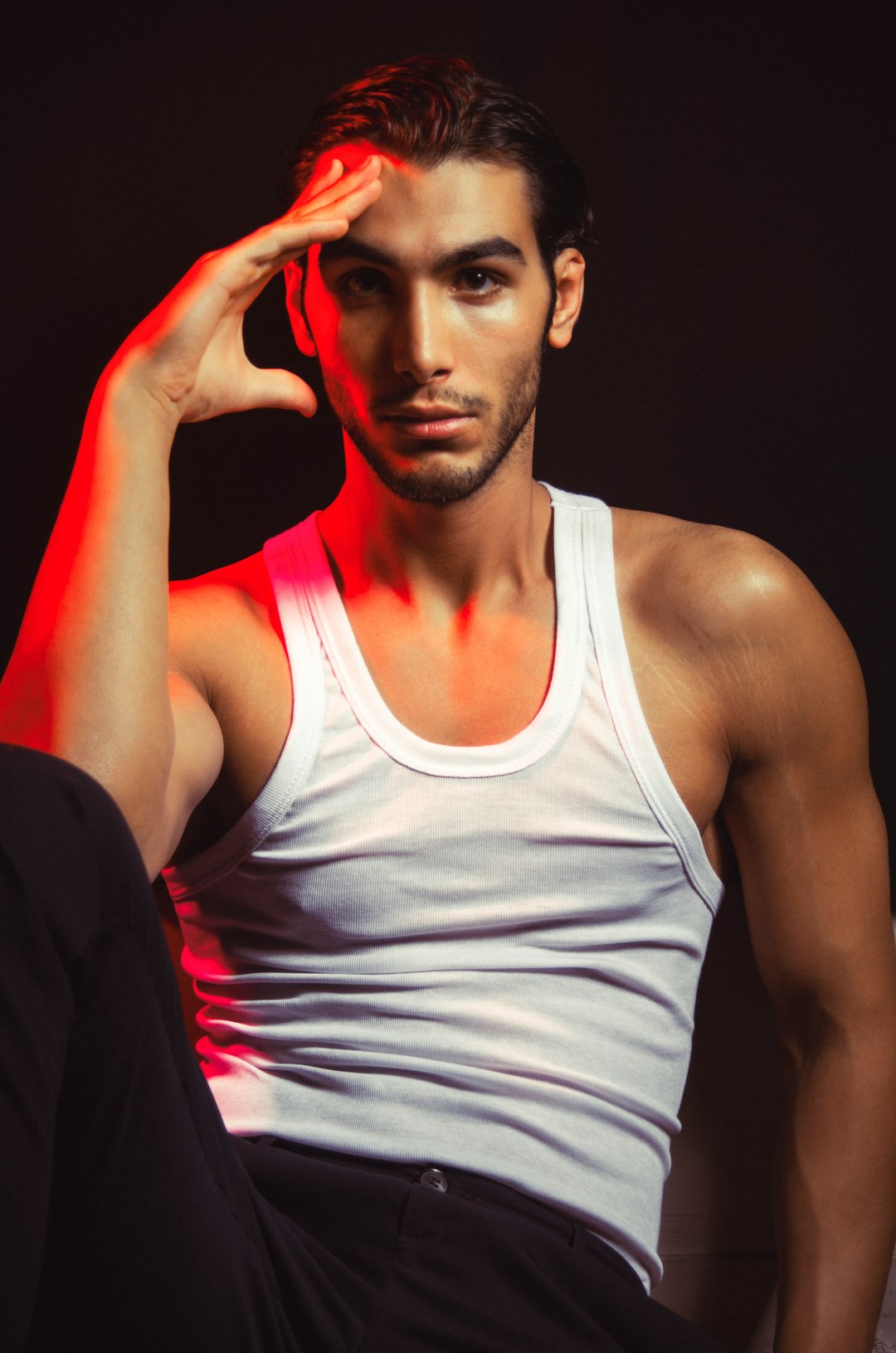 man in white tank top